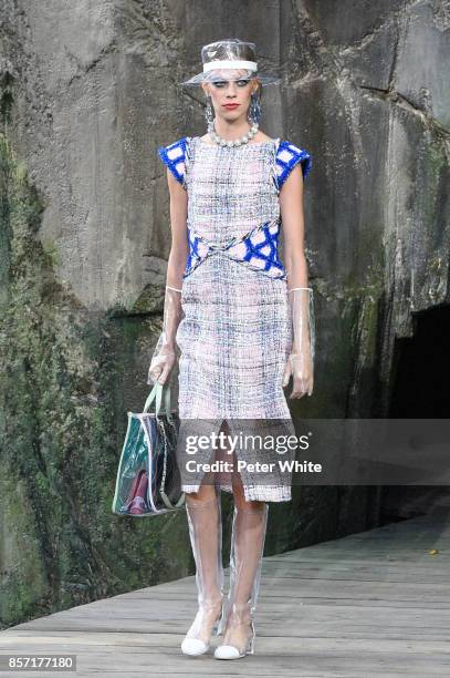 Lexi Boling walks the runway during the Chanel Paris show as part of the Paris Fashion Week Womenswear Spring/Summer 2018 on October 3, 2017 in...