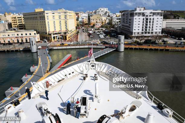 In this U.S. Navy handout, the Military Sealift Command hospital ship USNS Comfort arrives for humanitarian operations on October 3, 2017 in San...