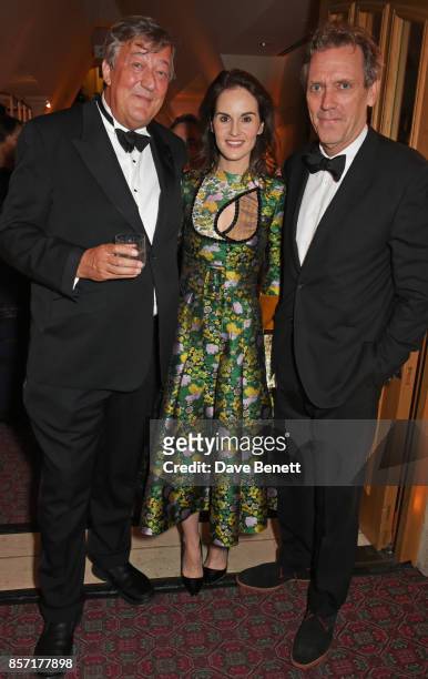 Stephen Fry, Michelle Dockery and Hugh Laurie attend the BFI and IWC Luminous Gala at The Guildhall on October 3, 2017 in London, England.