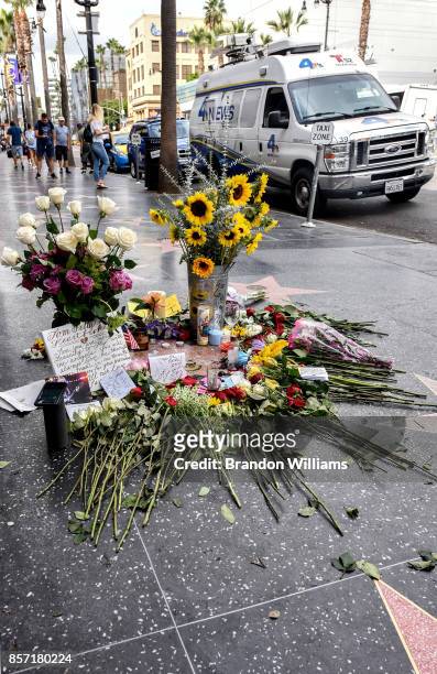 Flowers and notes are placed on the star of Tom Petty on behalf of the Hollywood community by the Hollywood Historic Trust on the Hollywood Walk of...