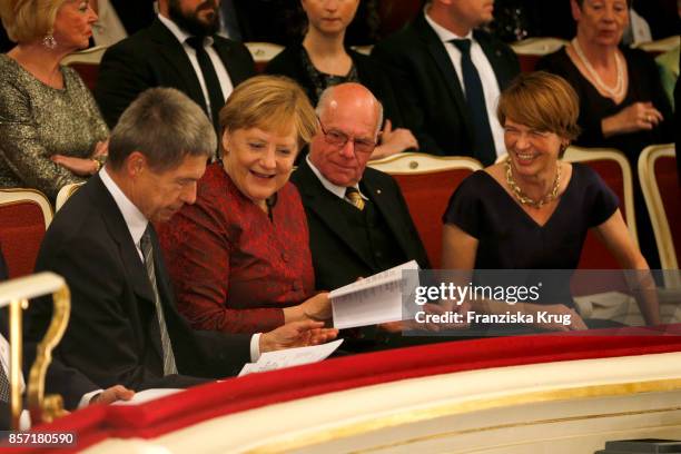 German Chancellor Angela Merkel, her husband Joachim Sauer , politician Norbert Lammertand Elke Buedenbender attend the Re-Opening of the Staatsoper...