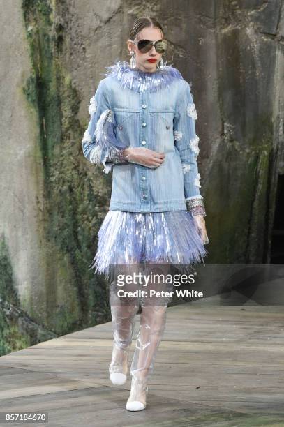 Odette Pavlova walks the runway during the Chanel Paris show as part of the Paris Fashion Week Womenswear Spring/Summer 2018 on October 3, 2017 in...