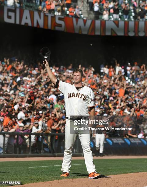 Matt Cain of the San Francisco Giants comes out to say a final goodbye to the fans after the Giants defeated the San Diego Padres 5-4 on a walk-off...