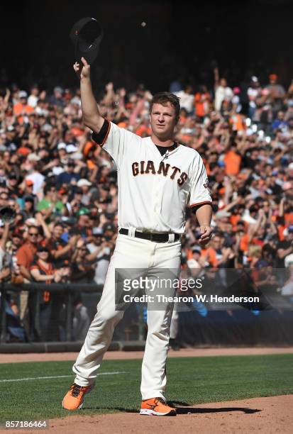 Matt Cain of the San Francisco Giants comes out to say a final goodbye to the fans after the Giants defeated the San Diego Padres 5-4 on a walk-off...