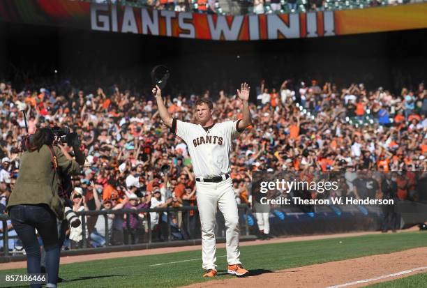 Matt Cain of the San Francisco Giants comes out to say a final goodbye to the fans after the Giants defeated the San Diego Padres 5-4 on a walk-off...