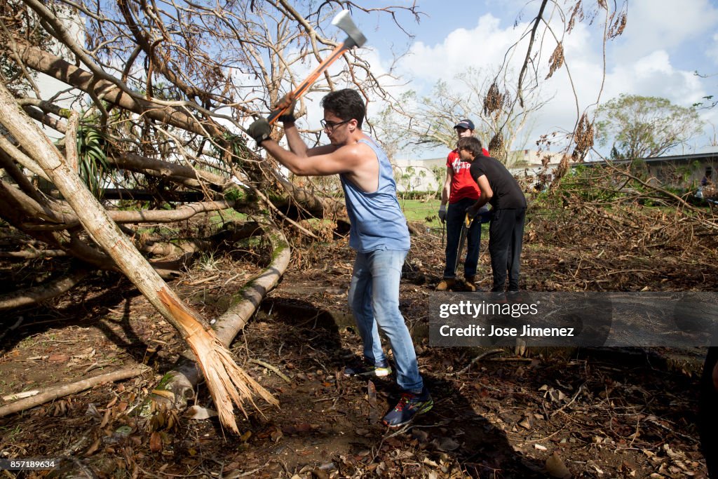 Students and faculty clean up University of Puerto Rico after Hurricane Maria.