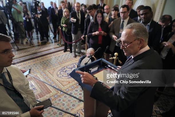Senate Minority Leader Charles Schumer speaks to reporters following the weekly Senate Democratic policy luncheon at the U.S. Capitol October 3, 2017...