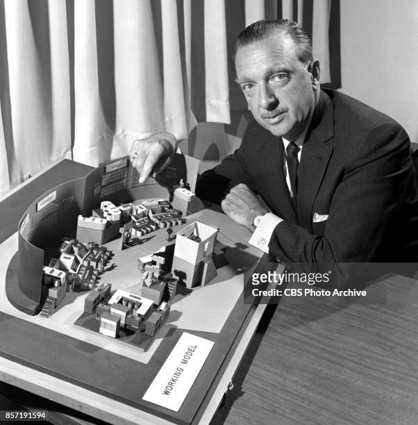 News anchor Walter Cronkite with a scale model of the election night studio. The United States midterm elections results and returns will be reported...