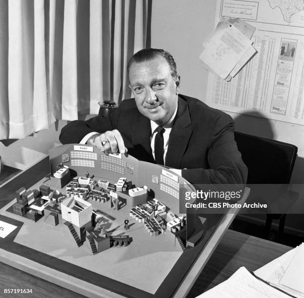 News anchor Walter Cronkite with a scale model of the election night studio. The United States midterm elections results and returns will be reported...