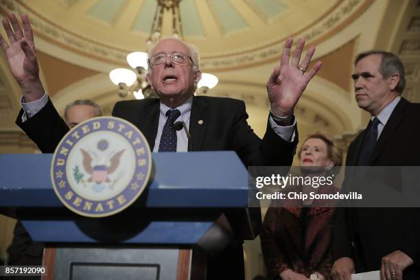 Senate Budget Committee ranking member Sen. Bernie Sanders and fellow committee members Sen. Debbie Stabenow and Sen. Jeff Merkley speak to reporters...