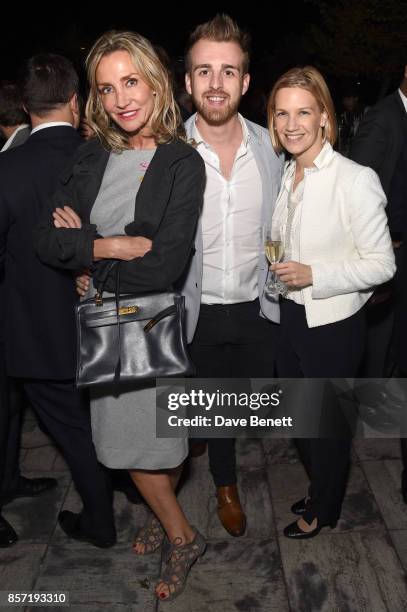 Marie Moatti, Christopher WIlson and Kalina Boyadjiew attend The Dragon Group's sixth anniversary celebrations on October 3, 2017 in London, England.