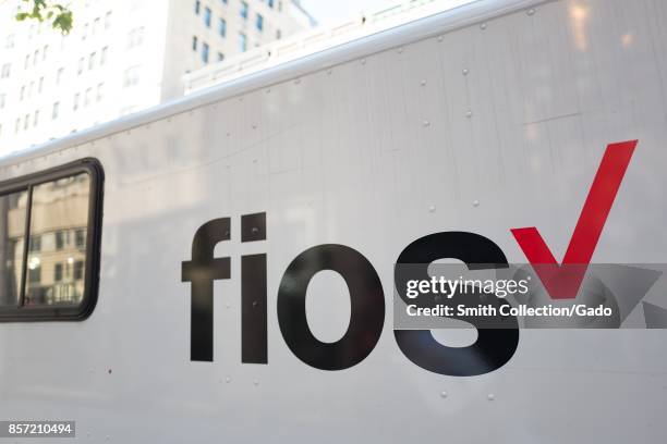 Logo for the Verizon Fios fiber optic internet service on the side of a truck on Madison Avenue on the Upper East Side of Manhattan, New York City,...