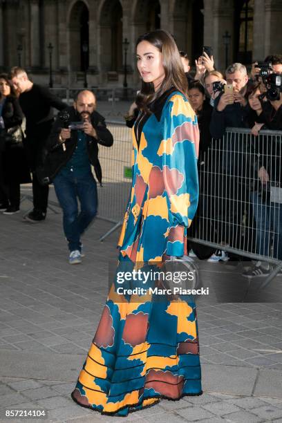 Actress Urassaya Sperbund attends the 'Louis Vuitton' fashion show at Louvre Pyramid on October 3, 2017 in Paris, France.