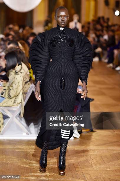 Model walks the runway at the Thom Browne Spring Summer 2018 fashion show during Paris Fashion Week on October 3, 2017 in Paris, France.