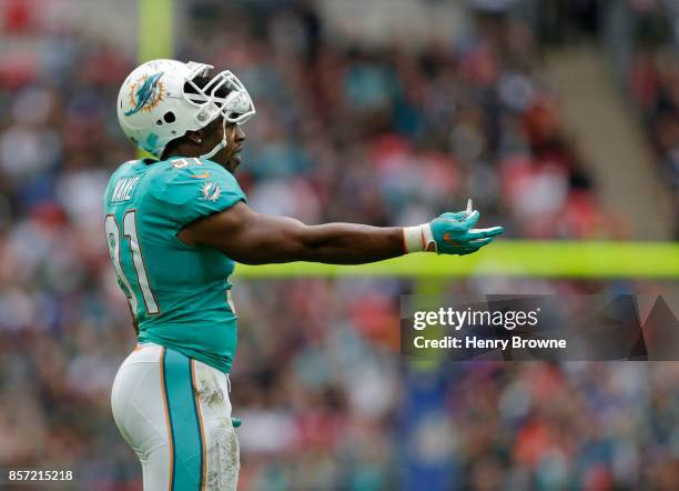 Cameron Wake of the Miami Dolphins during the NFL game between the Miami Dolphins and the New Orleans Saints at Wembley Stadium on October 1, 2017 in...