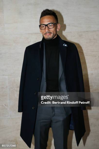Football player Hidetoshi Nakata attends the Louis Vuitton show as part of the Paris Fashion Week Womenswear Spring/Summer 2018 on October 3, 2017 in...