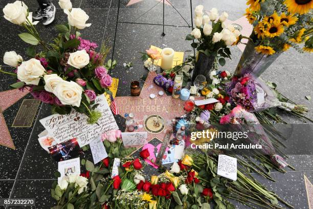 Flowers are placed on musician Tom Petty's star on The Hollywood Walk of Fame on October 3, 2017 in Hollywood, California. Petty died on October 2,...