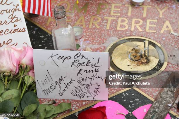 Flowers are placed on musician Tom Petty's star on The Hollywood Walk of Fame on October 3, 2017 in Hollywood, California. Petty died on October 2,...