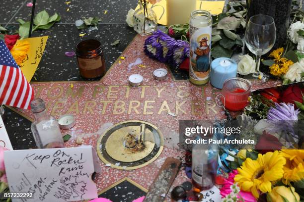 Flowers are placed on musician Tom Petty's star on The Hollywood Walk of Fame on October 3, 2017 in Hollywood, California. Petty died on October 2,...