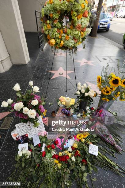 Flowers are placed on musician Tom Petty's star on The Hollywood Walk of Fame on October 3, 2017 in Hollywood, California. Petty died on October 2,...