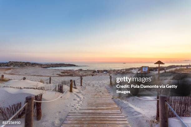 es pujols beach in formentera at dawn balearic islands, spain - formentera foto e immagini stock