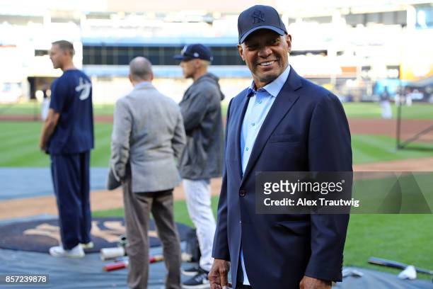 Hall of Famer Reggie Jackson look on during batting practice prior to the American League Wild Card game between the Minnesota Twins and New York...