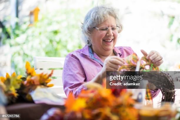 senior women crafting - craft stock pictures, royalty-free photos & images