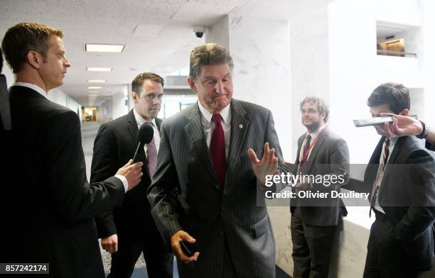 Sen. Joe Manchin leaves a closed briefing of the Senate Intelligence Committee on October 3, 2017 in Washington, DC.