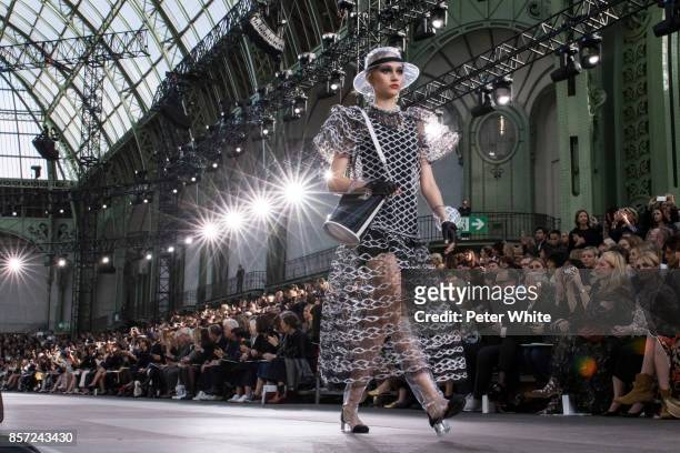 Michelle Gutknecht walks the runway during the Chanel Paris show as part of the Paris Fashion Week Womenswear Spring/Summer 2018 on October 3, 2017...