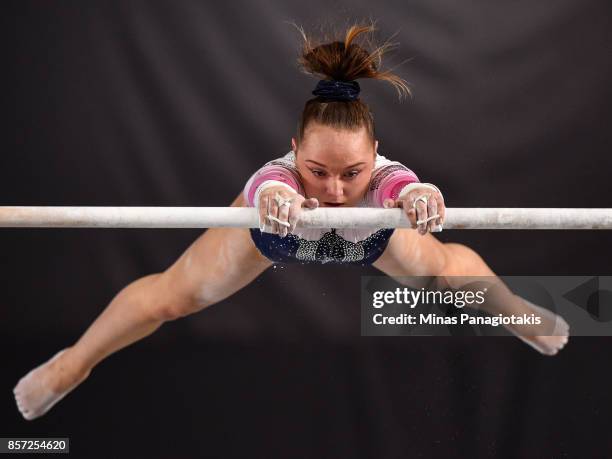 Amy Tinkler of Great Britain competes on the uneven bars during the qualification round of the Artistic Gymnastics World Championships on October 3,...