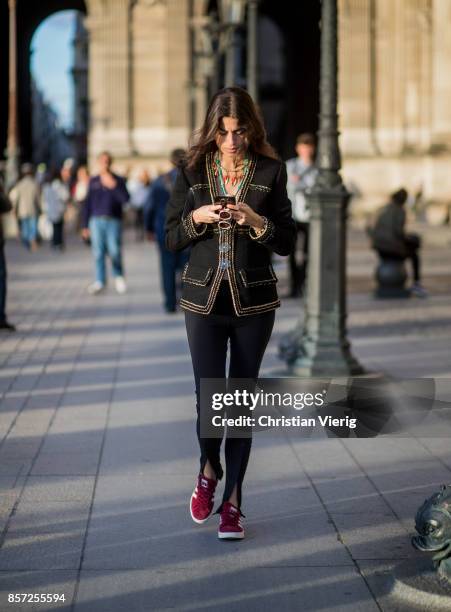Leandra Medine seen outside Louis Vuitton during Paris Fashion Week Spring/Summer 2018 on October 3, 2017 in Paris, France.