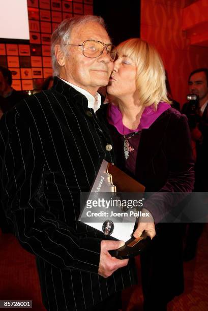 Harry Valerien and his wife Randy pose with his Herbert Award after the Herbert Award 2009 Gala at the Elysee Hotel on March 30, 2009 in Hamburg,...