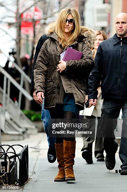 Actress Jennifer Aniston walks to her trailer at "The Baster" movie set in the West Village on March 30, 2009 in New York City.