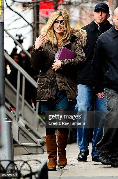 Actress Jennifer Aniston walks to her trailer at "The Baster" movie set in the West Village on March 30, 2009 in New York City.