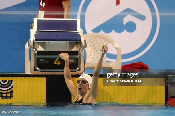 Justine Morrier of Canada celebrates after swimming the 100 metres breaststroke breaking the Canadian Record in the SB14 100-m breaststroke in...