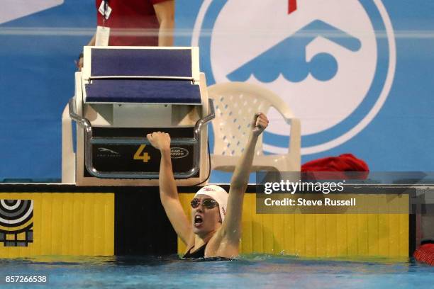 Justine Morrier of Canada celebrates after swimming the 100 metres breaststroke breaking the Canadian Record in the SB14 100-m breaststroke in...