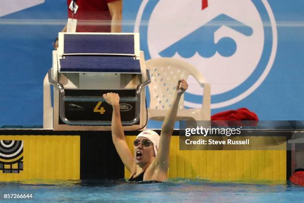 Justine Morrier of Canada celebrates after swimming the 100 metres breaststroke breaking the Canadian Record in the SB14 100-m breaststroke in...