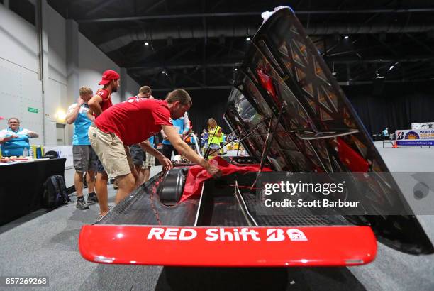 Team member works on the car as RED Shift, the car from the Netherlands Solar Team Twente is tested during Static Scrutineering before competing in...