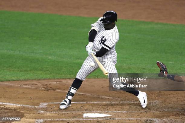 Didi Gregorius of the New York Yankees hits a three run home run against Ervin Santana of the Minnesota Twins during the first inning in the American...
