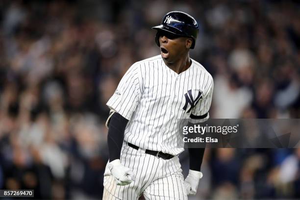 Didi Gregorius of the New York Yankees celebrates after hitting a three run home run against Ervin Santana of the Minnesota Twins during the first...