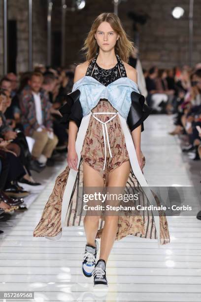 Model walks the runway during the Louis Vuitton Spring Summer 2018 show as part of Paris Fashion Week at Musee du Louvre on October 3, 2017 in Paris,...
