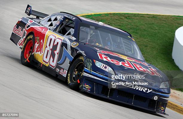 Brian Vickers, driver of the Red Bull Toyota, races during the NASCAR Sprint Cup Series Goody's Fast Pain Relief 500 at the Martinsville Speedway on...