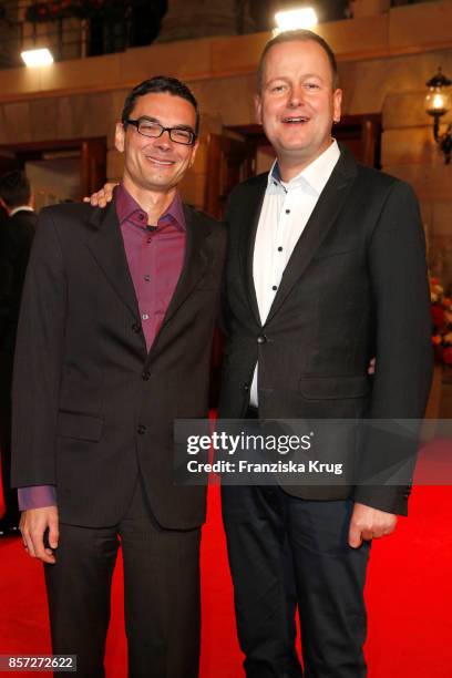 German politician Klaus Lederer and his husband Dirk Behrendt attend the Re-Opening of the Staatsoper Unter den Linden on October 3, 2017 in Berlin,...