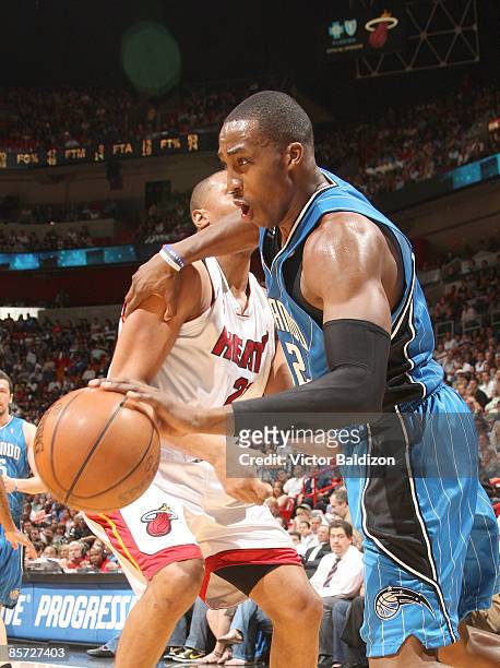 Dwight Howard of the Orlando Magic drives against the Miami Heat on March 30, 2009 at the American Airlines Arena in Miami, Florida. NOTE TO USER:...