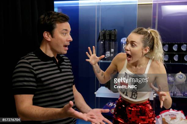 Episode 0750 -- Pictured: Host Jimmy Fallon with Singer/Songwriter Miley Cyrus during "Photobomb" on October 3, 2017 --