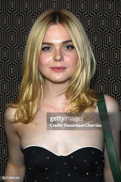 Elle Fanning attends the Miu Miu aftershow party as part of the Paris Fashion Week Womenswear Spring/Summer 2018 at Boum Boum on October 3, 2017 in...