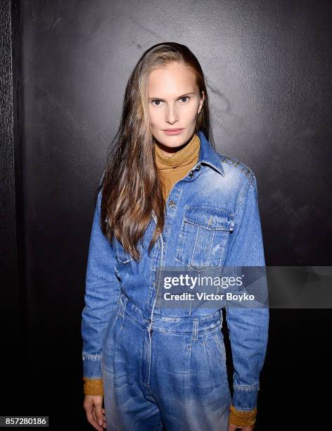 Guest attends the Miu Miu aftershow party as part of the Paris Fashion Week Womenswear Spring/Summer 2018 at Boum Boum on October 3, 2017 in Paris,...