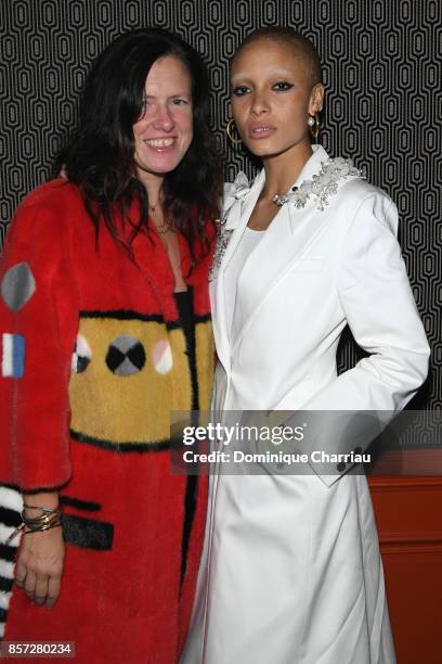 Adwoa Aboah and a guest attend the Miu Miu aftershow party as part of the Paris Fashion Week Womenswear Spring/Summer 2018 at Boum Boum on October 3,...