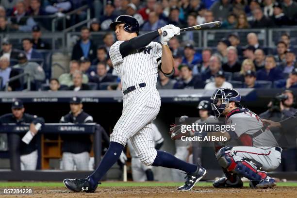 Aaron Judge of the New York Yankees hits a two run home run against Jose Berrios of the Minnesota Twins during the fourth inning in the American...