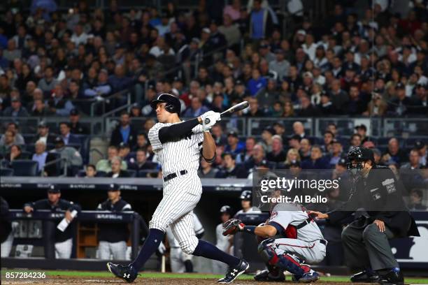 Aaron Judge of the New York Yankees hits a two run home run against Jose Berrios of the Minnesota Twins during the fourth inning in the American...